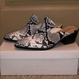 Black and white snake skin mules